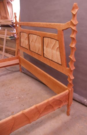 Side view of carved bed